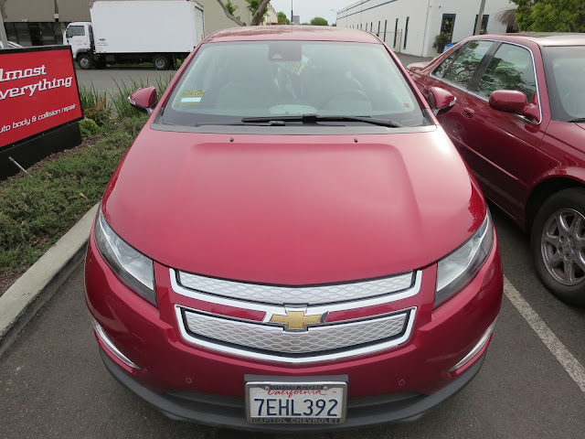 2014 Chevy Volt at Almost Everything body shop after repairs to hood, bumper and fender