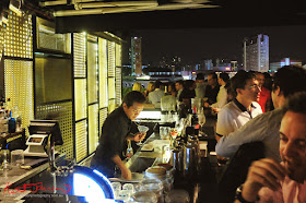 A view of the bar and the rooftop view of Singapore at Screening Room. Photo by Kent Johnson for Street Fashion Sydney.