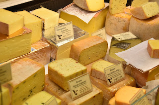 a market stall selling cheese