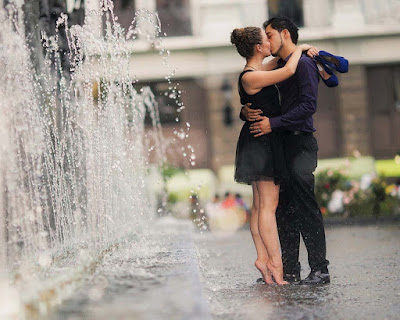 kissing-eachother-near-water-fall