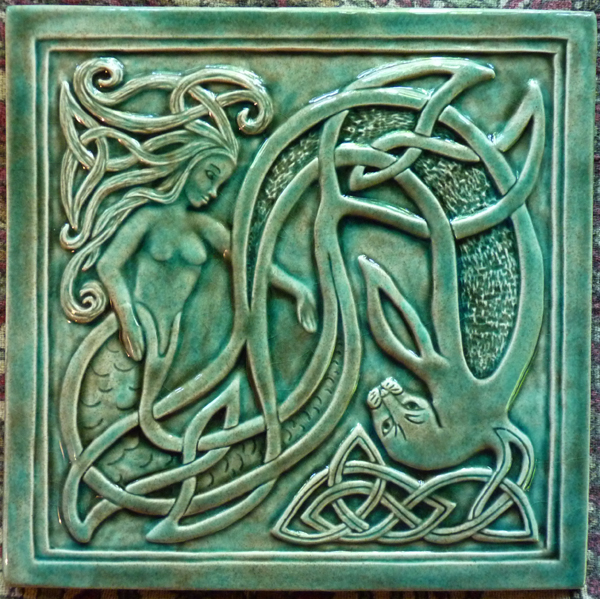 Decorative handmade ceramic tile: Decorative handmade, relief carved