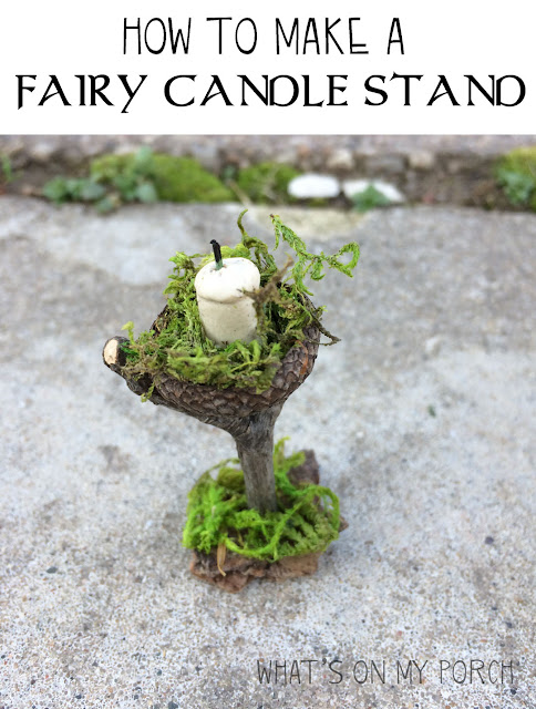 Fairy candle stand made from twigs and moss