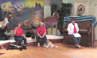 Laurel reads Braille for children at St. Thomas Episcopal VBS