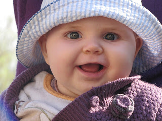 baby girl, blue hat, smiling face, by McStone