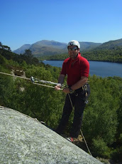 Abseiling with Snowdon in the background