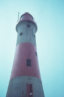 Red and white painted Beachy Head lighthouse, England