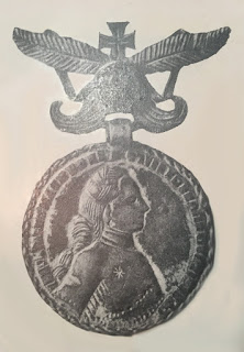 Дукач з медаллю Фрідріха ІІ