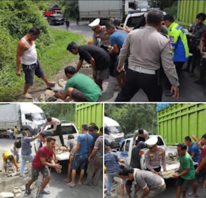 Sat Lantas Polres Tanggamus Bersama Warga Buka Bahu  jalan, di Temukan Satu Unit Truk Macet di Jalinbar Tanjakan Sedayu.