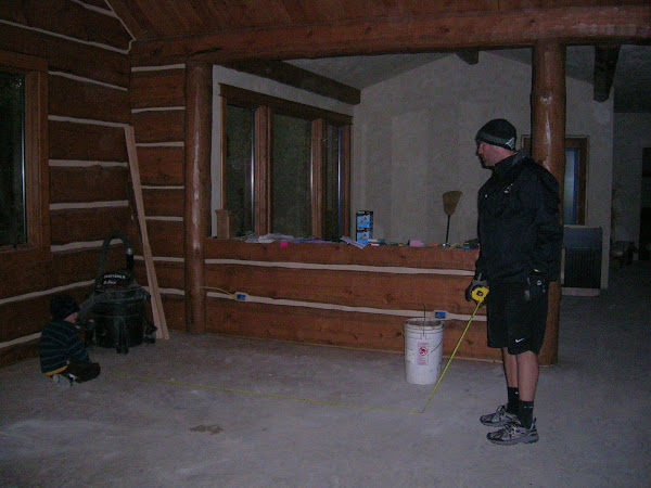 Quinn & Rob measuring for the floorcloth