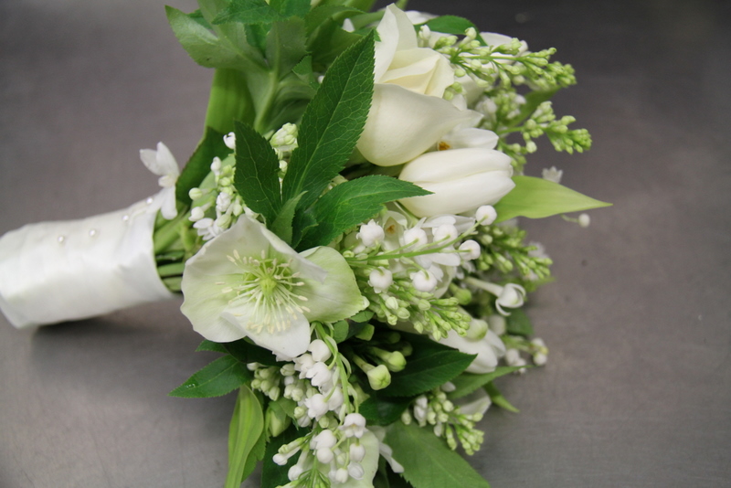 I adore this wedding bouquet of all white winter blooms it's light and 
