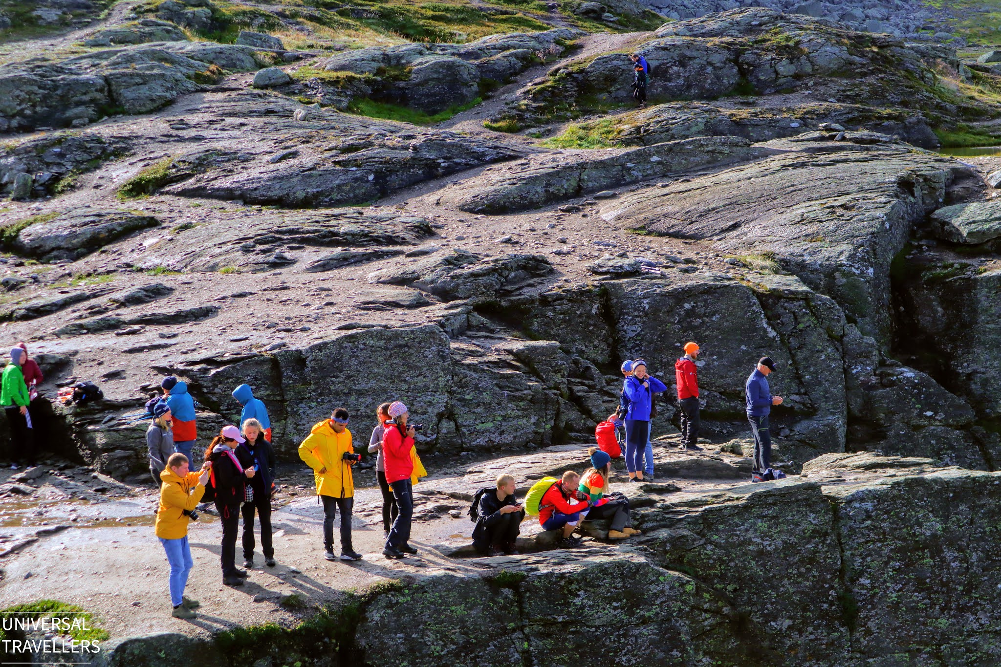 Hikers have gathered to take pictures of the Trolltunga Cliff along with the Lake Ringedalsvatnet