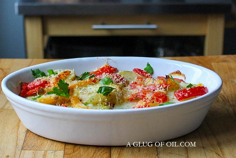 Potato gratin with peppers and cheese.