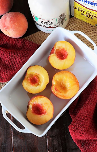 Fresh Peach Halves in Baking Dish Image