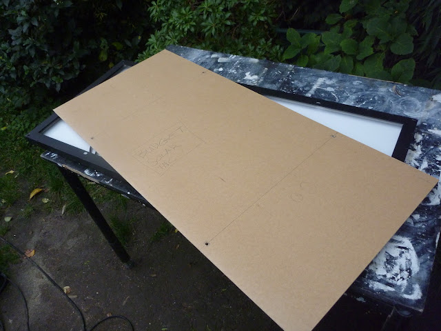 Hardboard template of the 100w BLD Solar panels. to assist in drilling the mounting holes.