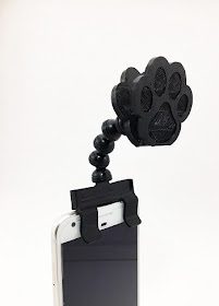 Flexy Paws attaches to any phone, tablet, and most cases