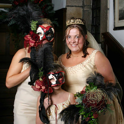 Flower Design Bridal bouquet and flower girl with her elaborate masquerade