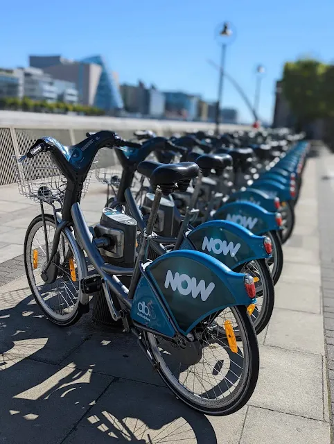 Dublin Bikes stand along the River Liffey