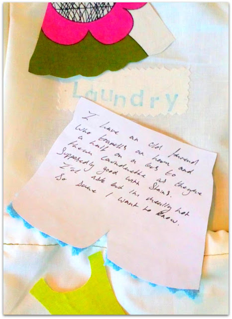 Handwritten anecdote on paper cut-out laundry shape.