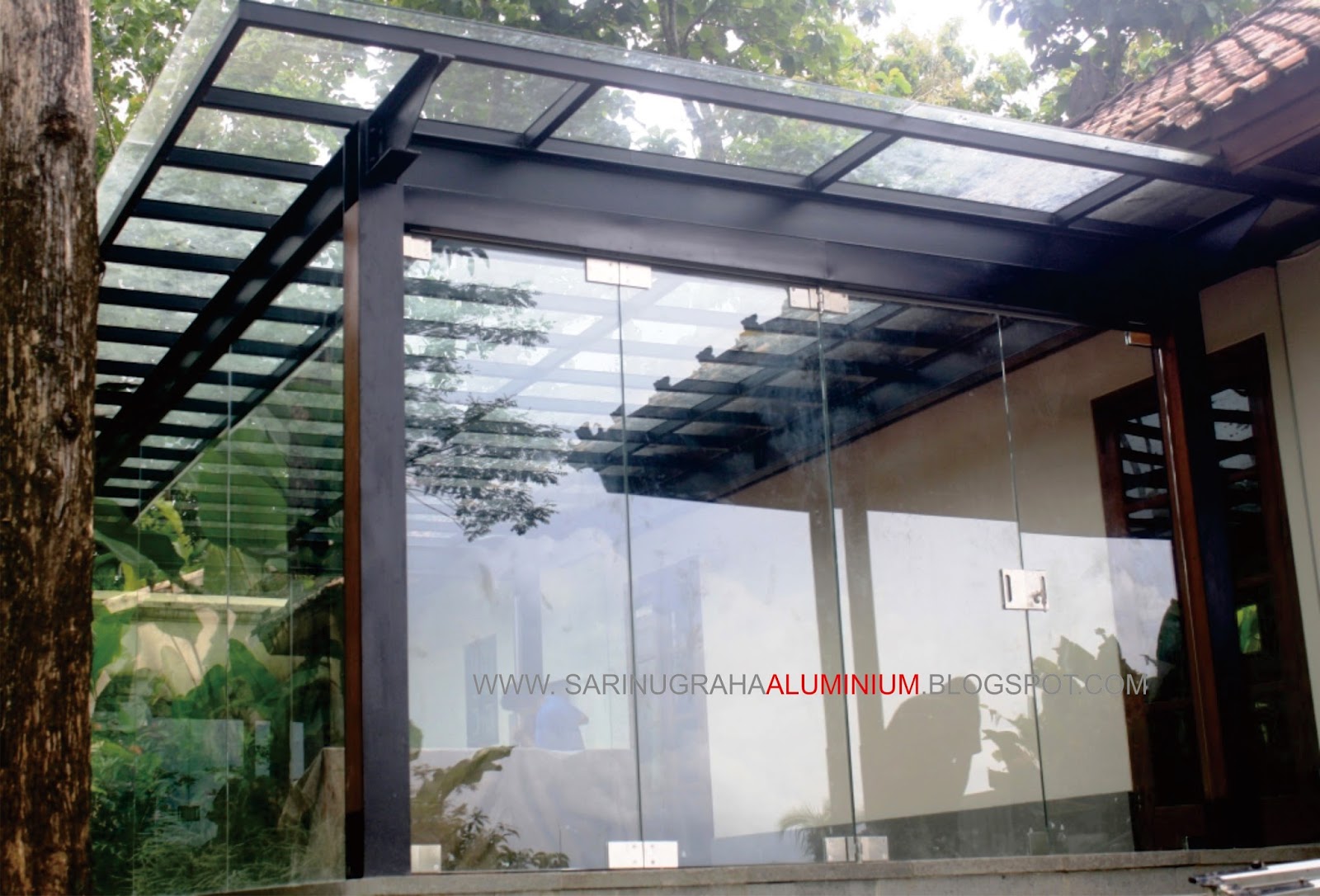 Sari Nugraha Aluminium Kaca Construction Pintu  lipat  kaca 