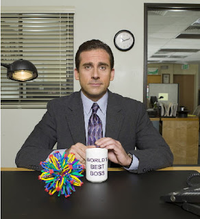 Quit mugging for the camera, Michael. Get it? 'Cause there's a mug. Aw, forget it.