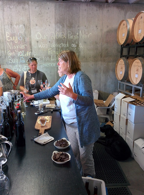 Serendipity Proprietor Judy Kingston pours in the tasting room