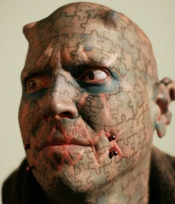 Most Unusual and Weird Face Tattoos 15 Images