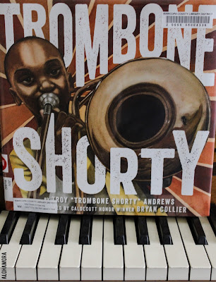 Trombone Shorty by Troy "Trombone Shorty" Andrews and illustrated by Bryan Collier is a fabulous kidlit picture book biography.  This non-fiction autobiography is perfect for elementary school kids studying biography.  It's even more perfect for the music loving kid.  Music teachers, librarians, and class teachers (2nd-6th grade) will love using this great story in lessons.  The pictures are fabulous, and they should be earning the Caldecott Honor . This book gets 4 out of 5 stars in my book review.  Great book, fabulous pictures, writing was good.  The writing could've been a bit more fluid, but it was a great read nonetheless. Alohamora Open a Book www.alohamoraopenabook.blogspot.com east, fast read, research, music, trombone, brass, New Orleans, black history