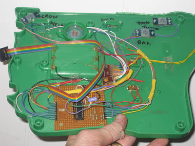 Hacked farm toy base showing microcontroller stripboard