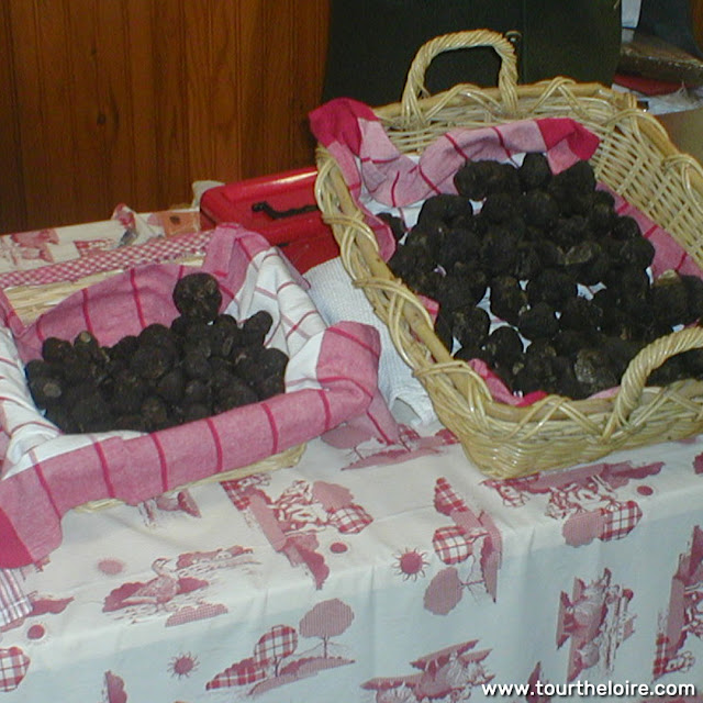 Black Truffles at a market, Indre et Loire, France. Photo by Loire Valley Time Travel.