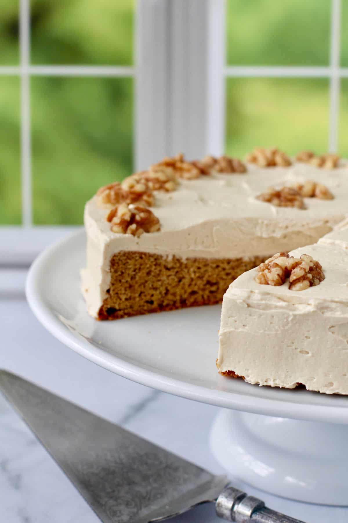 Walnut Espresso Cake with a slice removed.