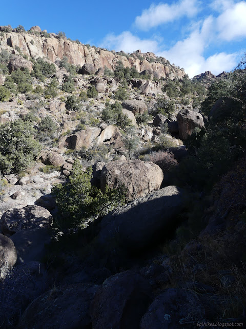 09: boulders below cliffs