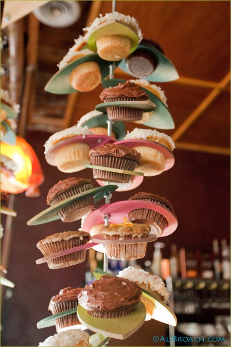 This moss covered branch stand gives the cupcake presentation a rustic