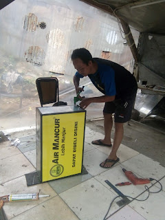 Neon box jamu Air Mancur Serang Banten