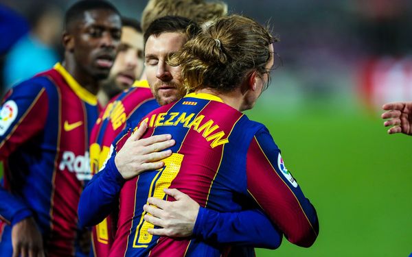 Messi and Griezmann hug after goal