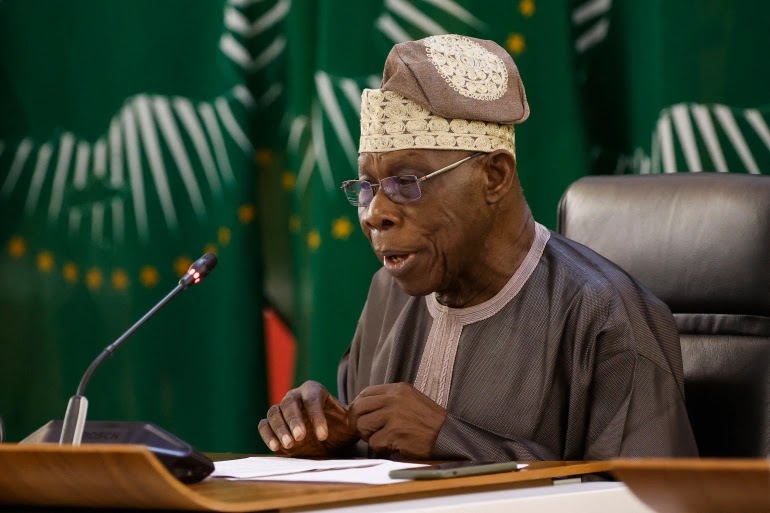 African Union Horn of Africa envoy and former Nigerian president Olusegun Obasanjo speaks during a press conference in Pretoria, South Africa [Phill Magakoe/AFP]