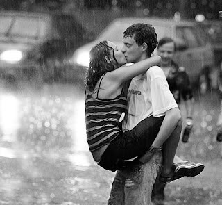 romantic kiss in the rain
