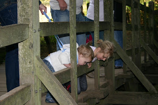 Top Ender and Baby Boy watching a river flow