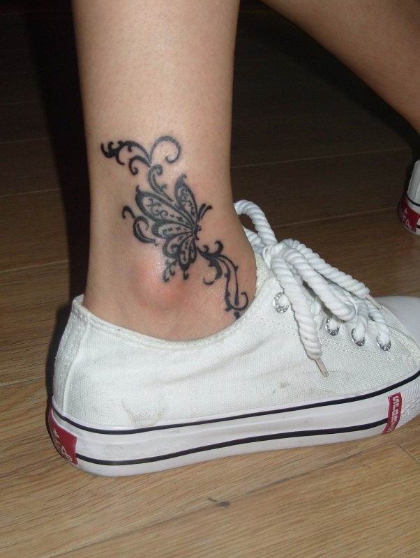 foot tattoo designs for women. Butterfly Tribal Tattoo Design. butterfly