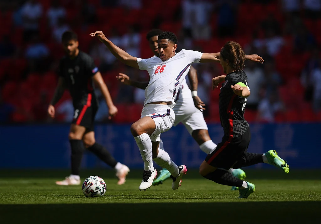 Jude Bellingham of England is challenged by Luka Modric of Croatia during the UEFA Euro 2020 Championship Group D match between England and Croatia at Wembley Stadium on June 13, 2021 in London, England