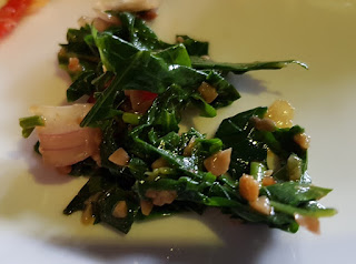 Urap singkong. This salad is made with finely shredded tapioca leaves. 