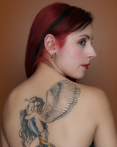 evil angel tattoos. evil angel tattoos.