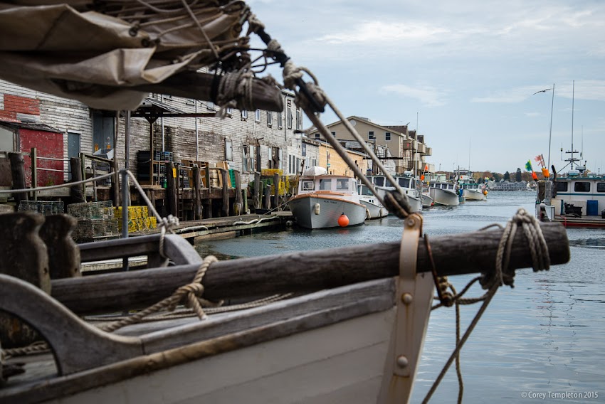 Portland, Maine USA November 2015 photo by Corey Templeton. Looking down Custom House Wharf beyond the bow of an interesting old sailboat.