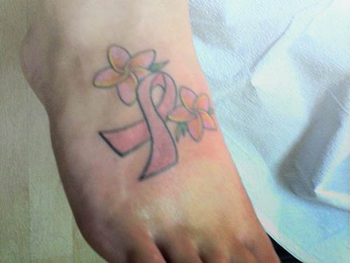 ribbon bow tattoo. Sexy pink ribbon tattoo