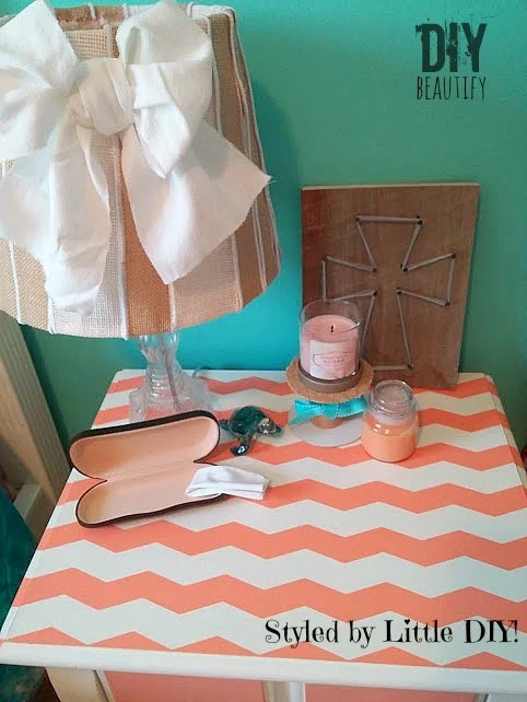 Learn how easy it is to add chevron stripes to a painted dresser or nightstand! You can find the tutorial at DIY beautify.