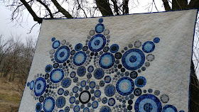 Modern snowflake quilt using Island Batik Alpine Ice fabrics
