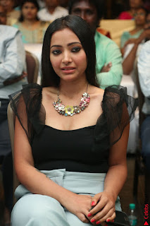 Swetha Basu in a Black Sleeveless Top Long Skirt at Mixture Potlam Movie Audio Launch 049.JPG