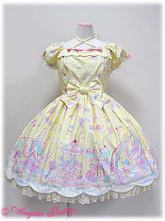 Angelic Pretty Milky Planet OP in yellow. A dessert themed world on a yellow background.