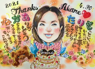 退職祝いケーキと似顔絵