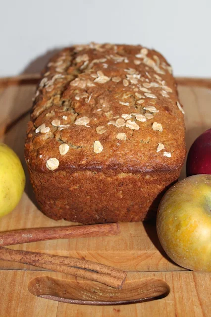 Finished loaf of applesauce oatmeal bread.