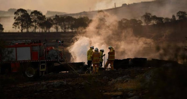 Australia is returning to heat and fire ... and evacuating areas in the capital
